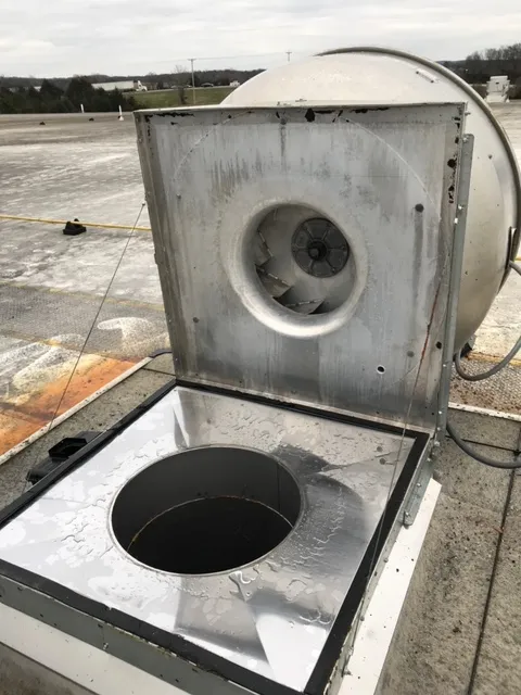 Before and after hood cleaning comparison showing grease removal results